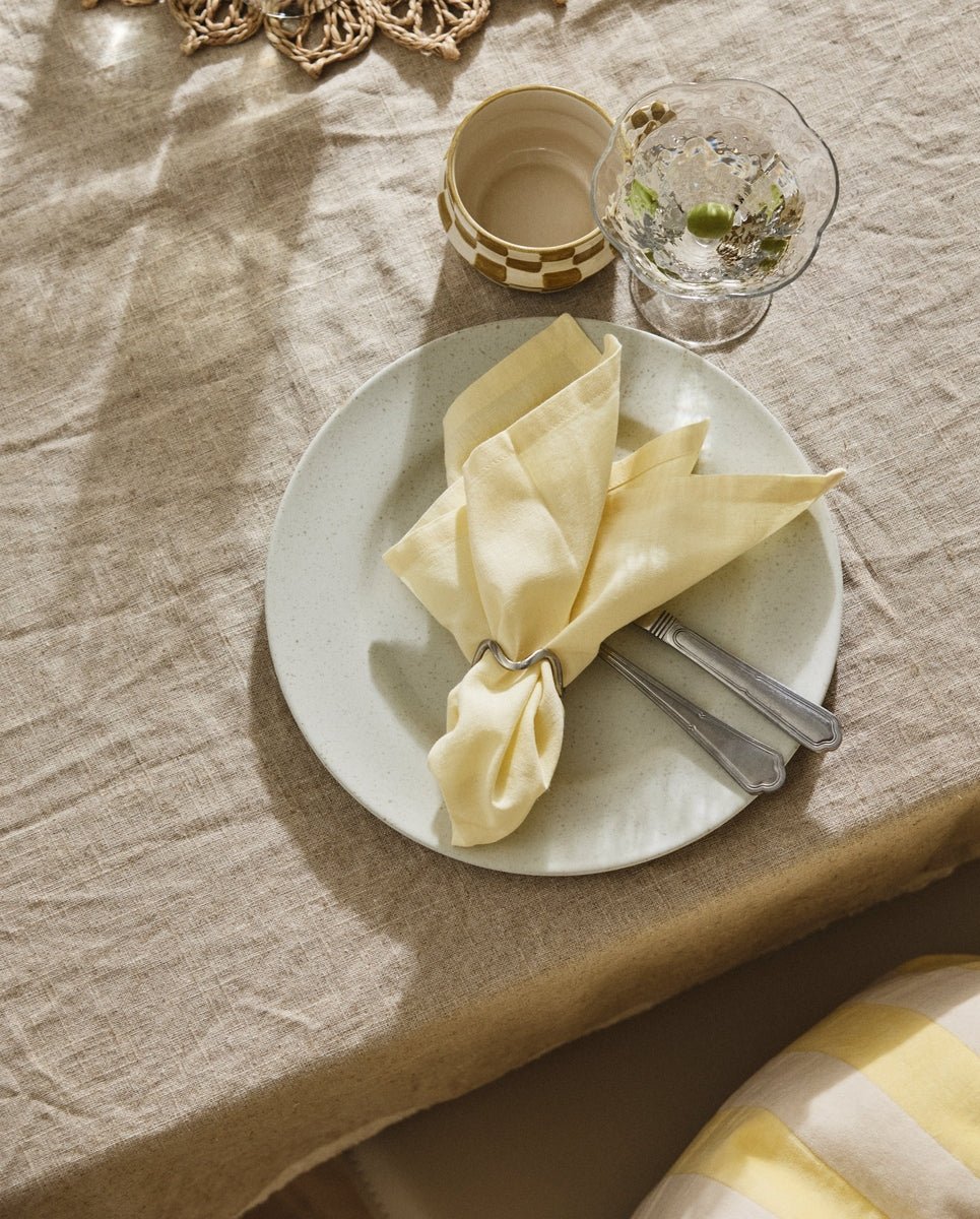 Napkin, light yellow, hemmed